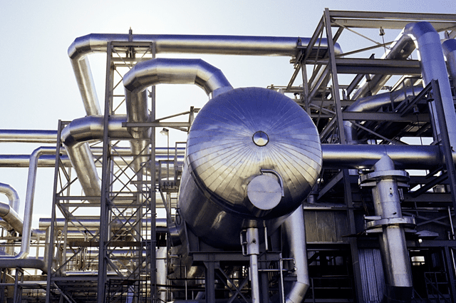 Large gray machinery with tubes and cylinders