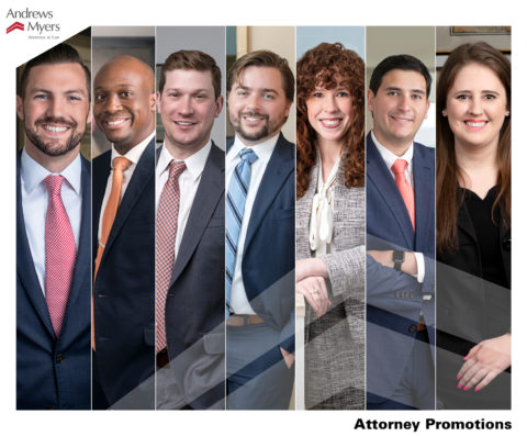 Two women and five men attorneys dressed in professional clothing
